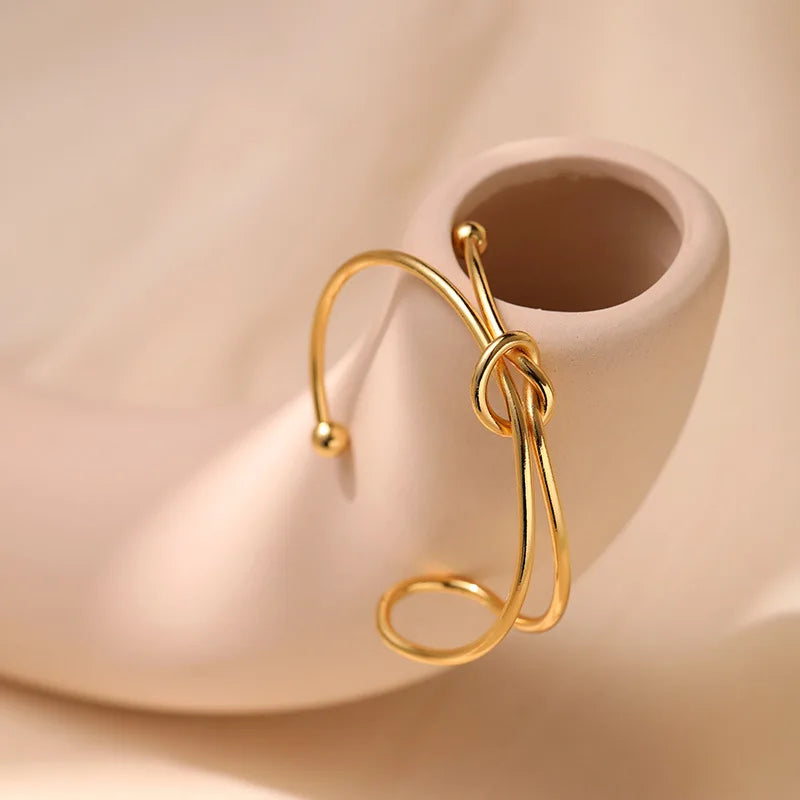 Elegant Twisted Copper Knot Cuff Bracelet for Women