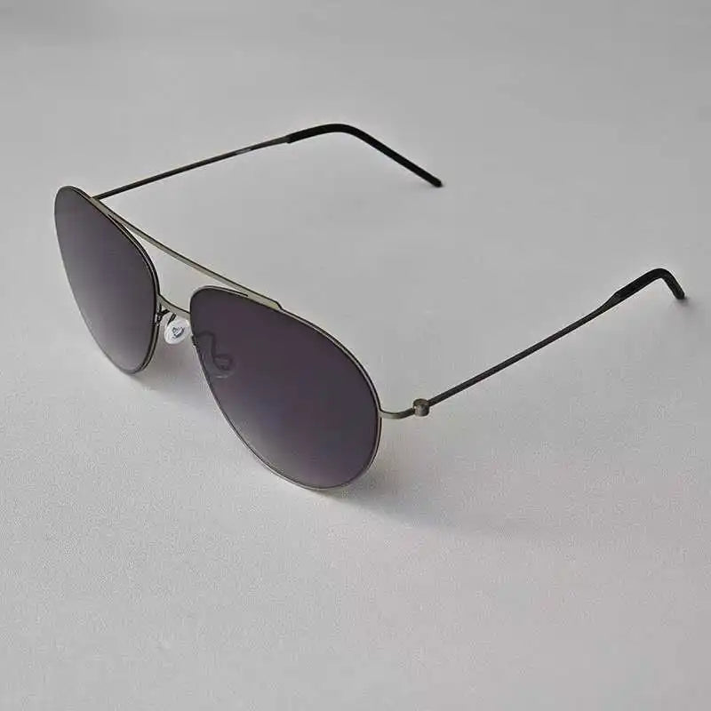 Ultra-leve titânio dinamarca marca grande para 8806 design masculino óculos de sol proteção uv parafuso sol piloto oval óculos