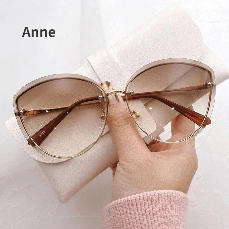 Elegant Rimless Women's Oval Sunglasses
